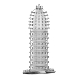 Guaina peniena trasparente in silicone con superficie testurizzata e base allargata, vista frontale.