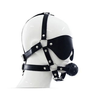 Vista laterale di harness viso nero regolabile con benda occhi e pallina gag