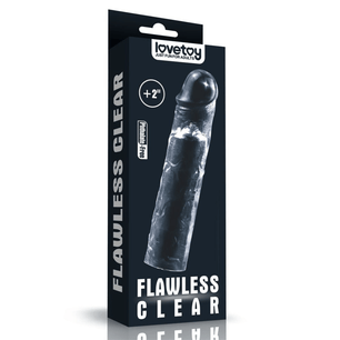 Confezione e guaina fallica trasparente Flawless Clear affiancate su sfondo chiaro