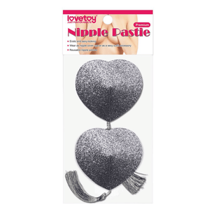 Copricapezzoli a cuore glitter argento con nappine Lovetoy in confezione originale, nipple pasties adesivi riutilizzabili.